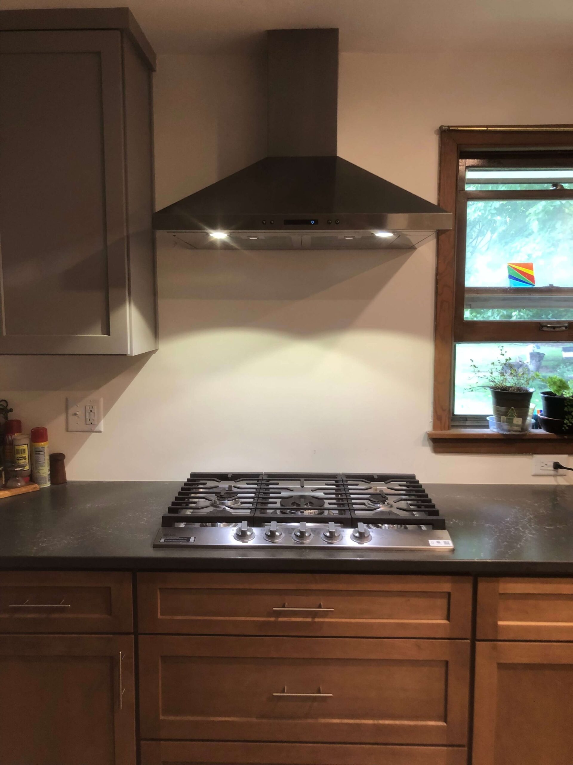 Range and hood installation in kitchen